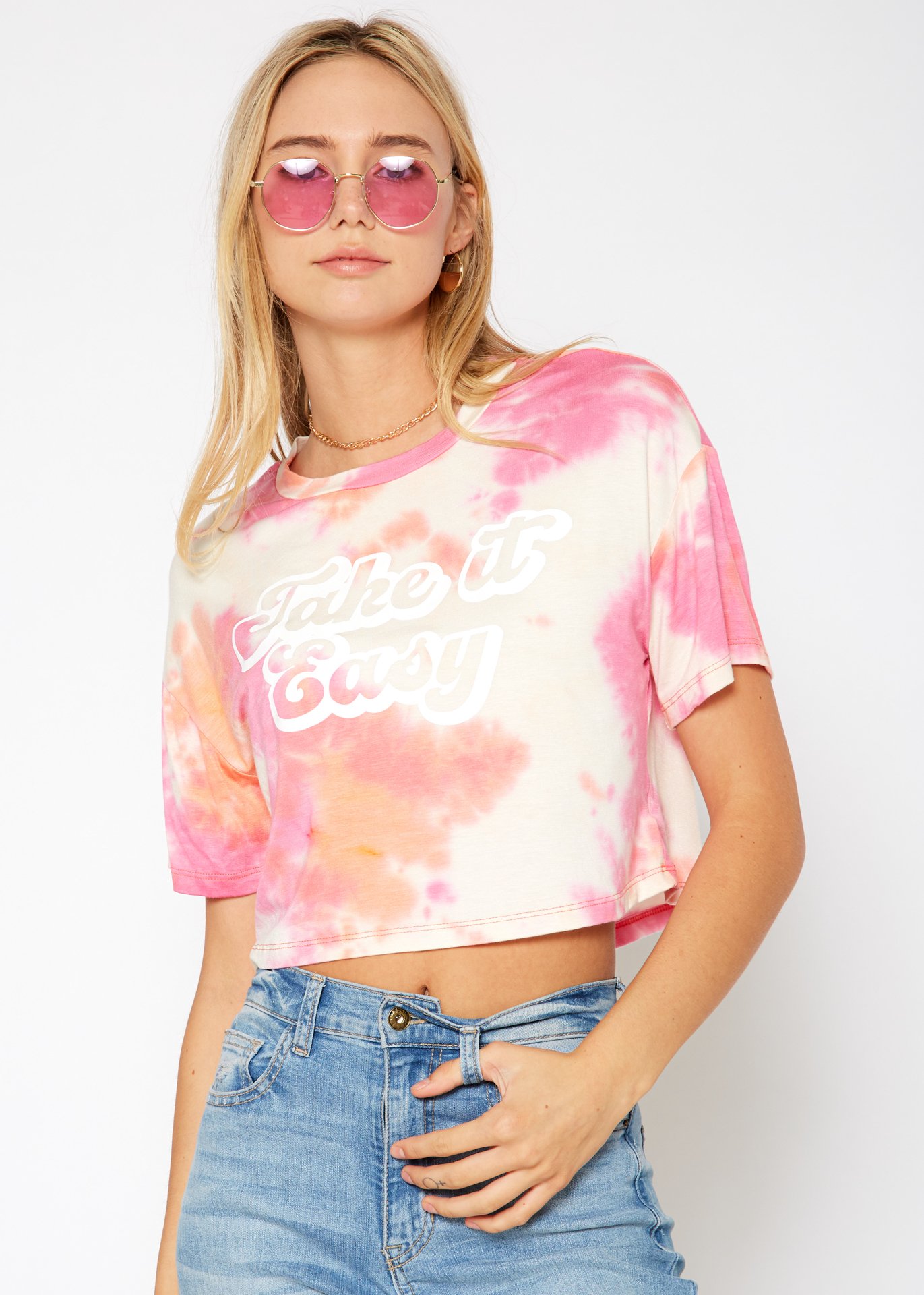 Women's 'Take it Easy' Printed Crop Top featuring a round neck and short sleeves, made from a soft rayon and spandex blend.