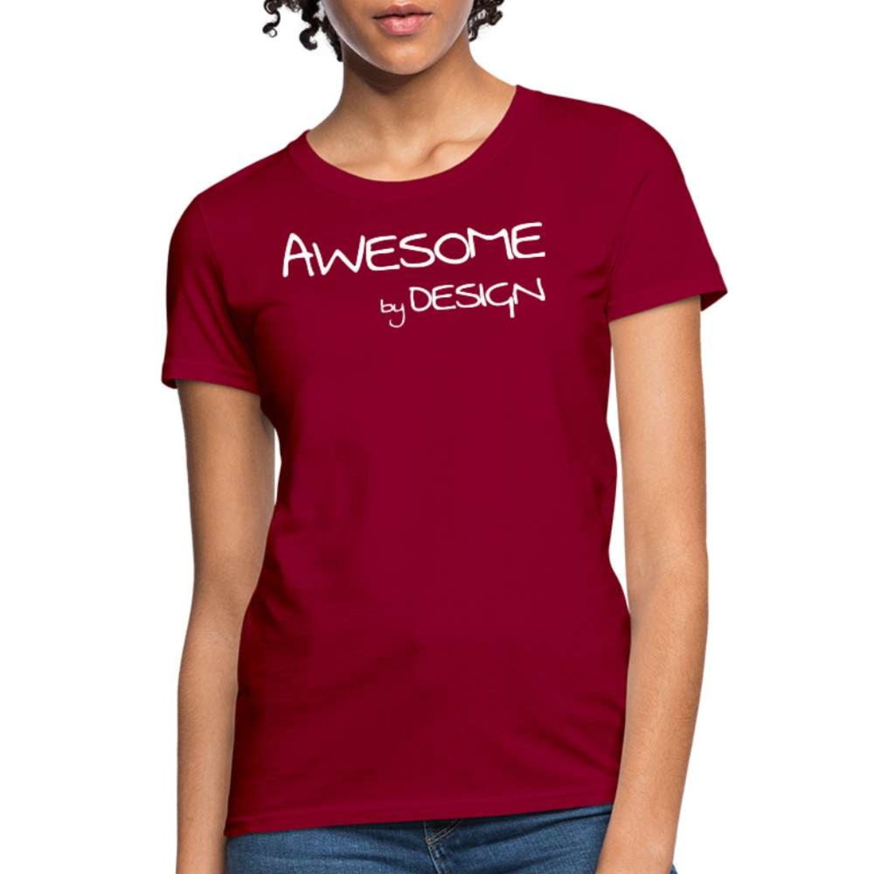 A stylish women's graphic tee featuring the phrase 'Awesome by Design', showcasing a feminine fit and available in multiple colors.