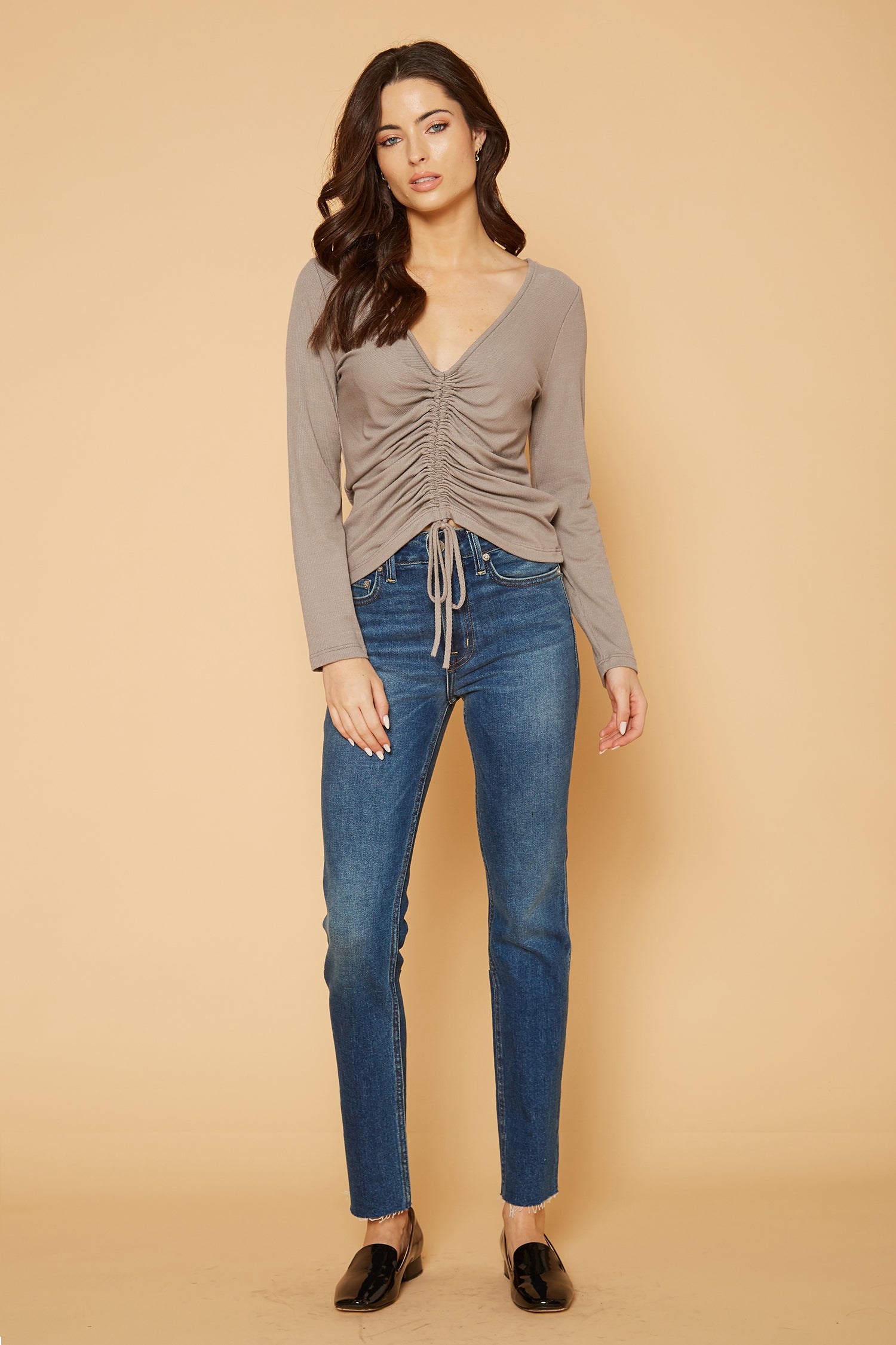 Women's V-Neck Ruched Top in Coco, featuring long sleeves and a stylish ruched front design.