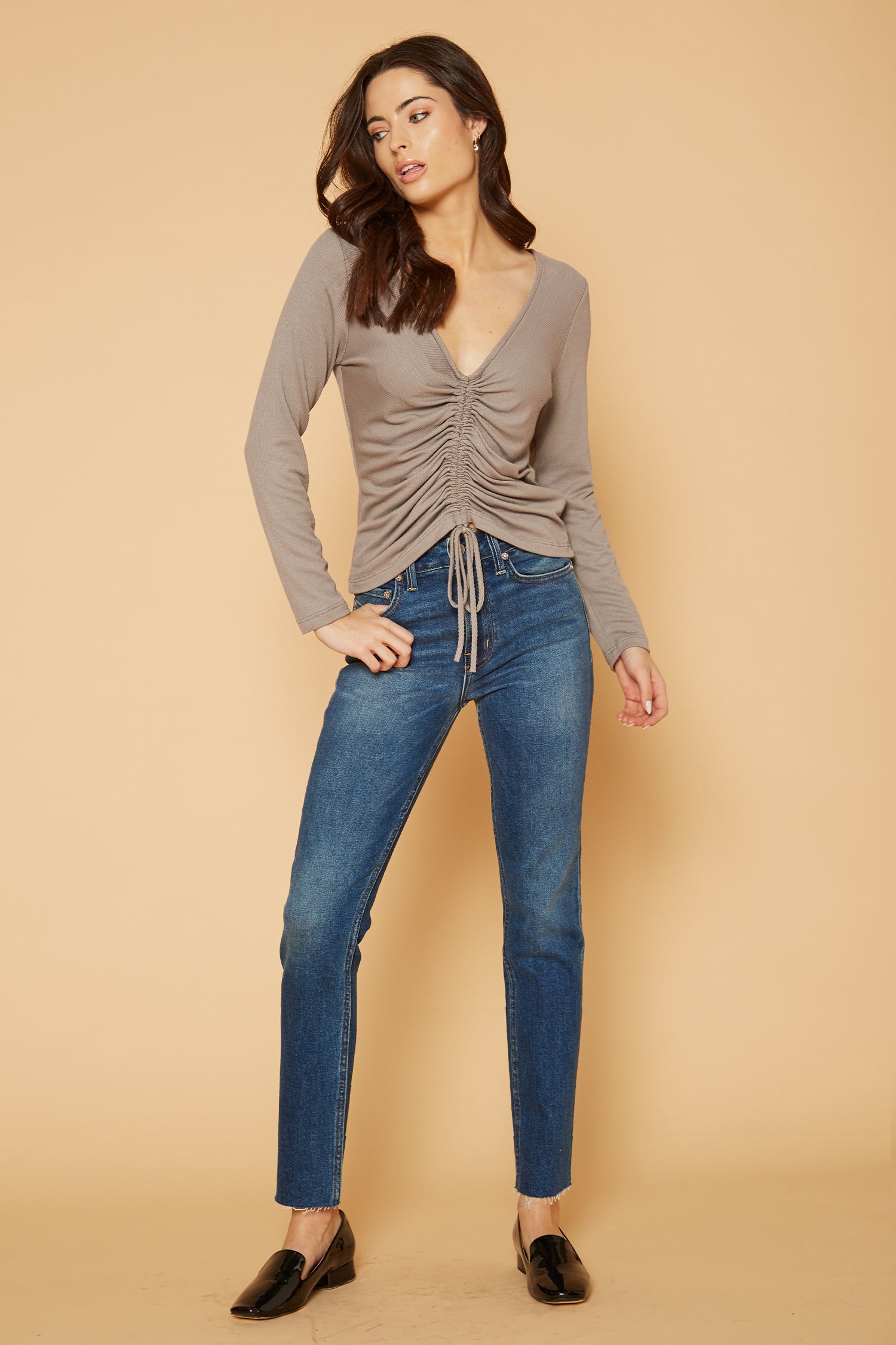 Women's V-Neck Ruched Top in Coco, featuring long sleeves and a stylish ruched front design.