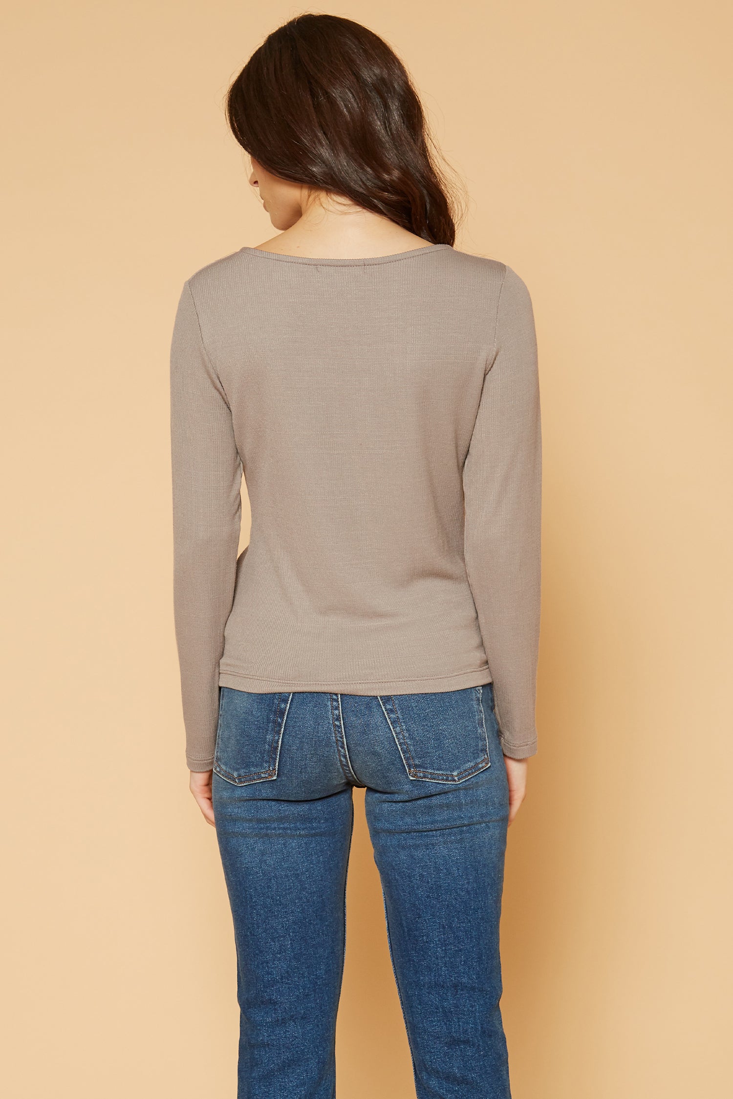 Women's V-Neck Ruched Top in Coco, featuring long sleeves and a stylish ruched front design.