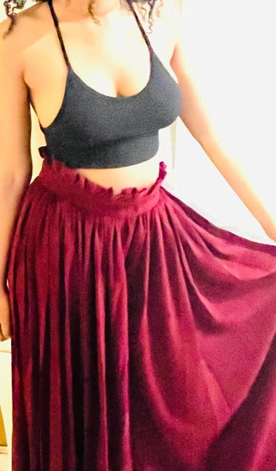 A pair of stylish Women's Wide Leg Palazzo Pants in Burgundy, featuring a pleated front and zipper, perfect for various occasions.