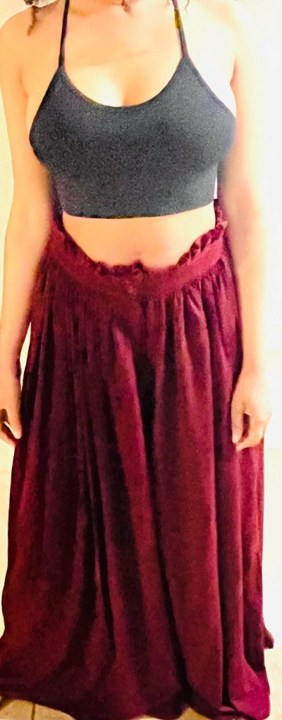 A pair of stylish Women's Wide Leg Palazzo Pants in Burgundy, featuring a pleated front and zipper, perfect for various occasions.