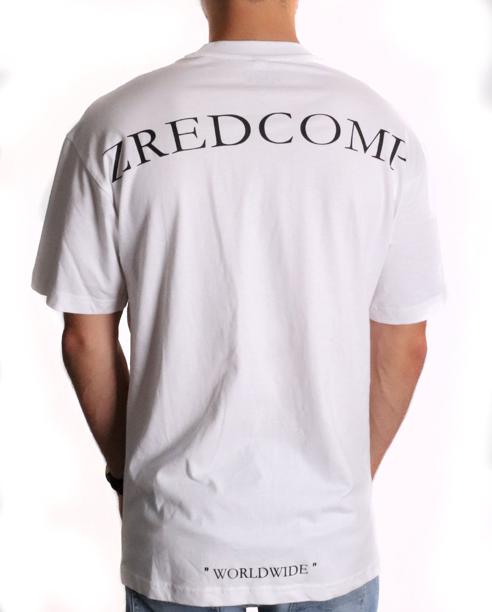 A stylish white oversized tee featuring 'ZREDCOMP' print on the back and international World print on the front, made from high-quality cotton.