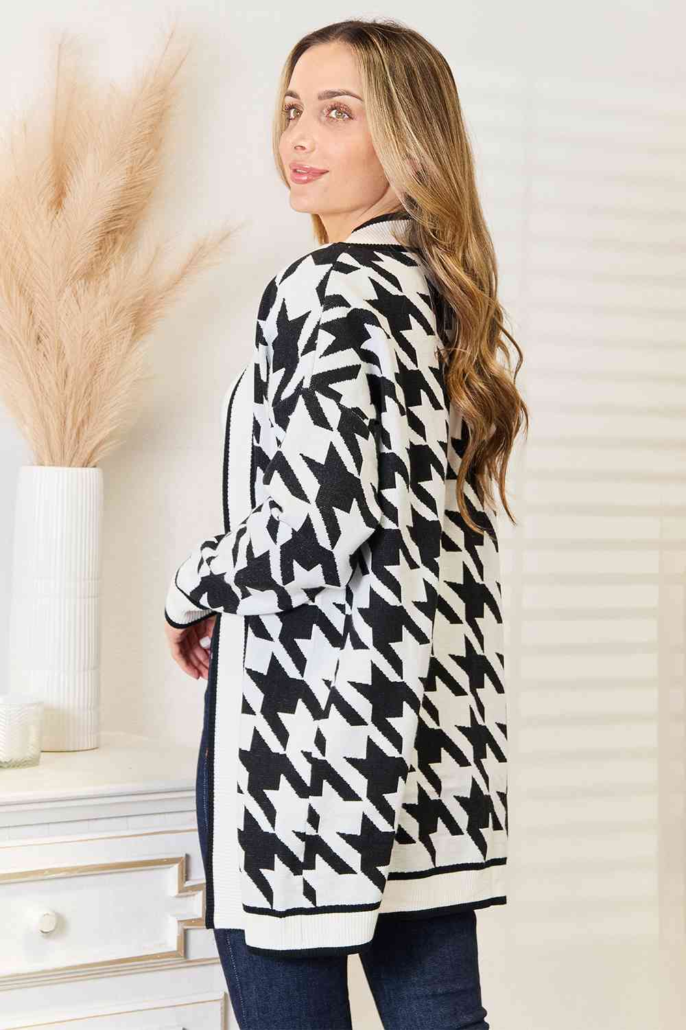 Woven Right Houndstooth Open Front Longline Cardigan displayed on a mannequin, showcasing its elegant design and classic pattern.