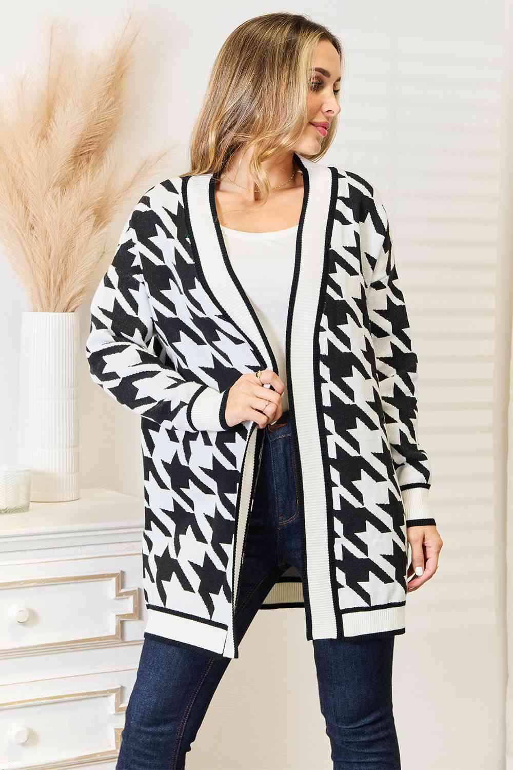 Woven Right Houndstooth Open Front Longline Cardigan displayed on a mannequin, showcasing its elegant design and classic pattern.