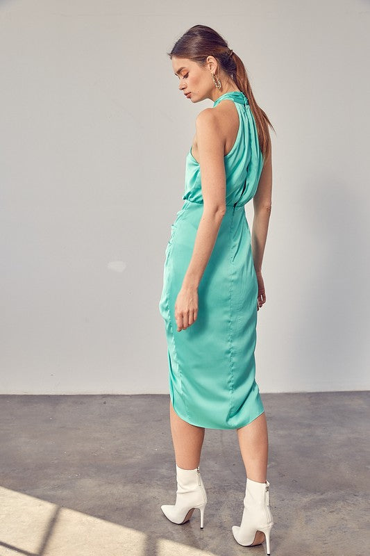 A stylish wrap cross neck dress in solid color, featuring a flattering silhouette and sleeveless design, perfect for various occasions.