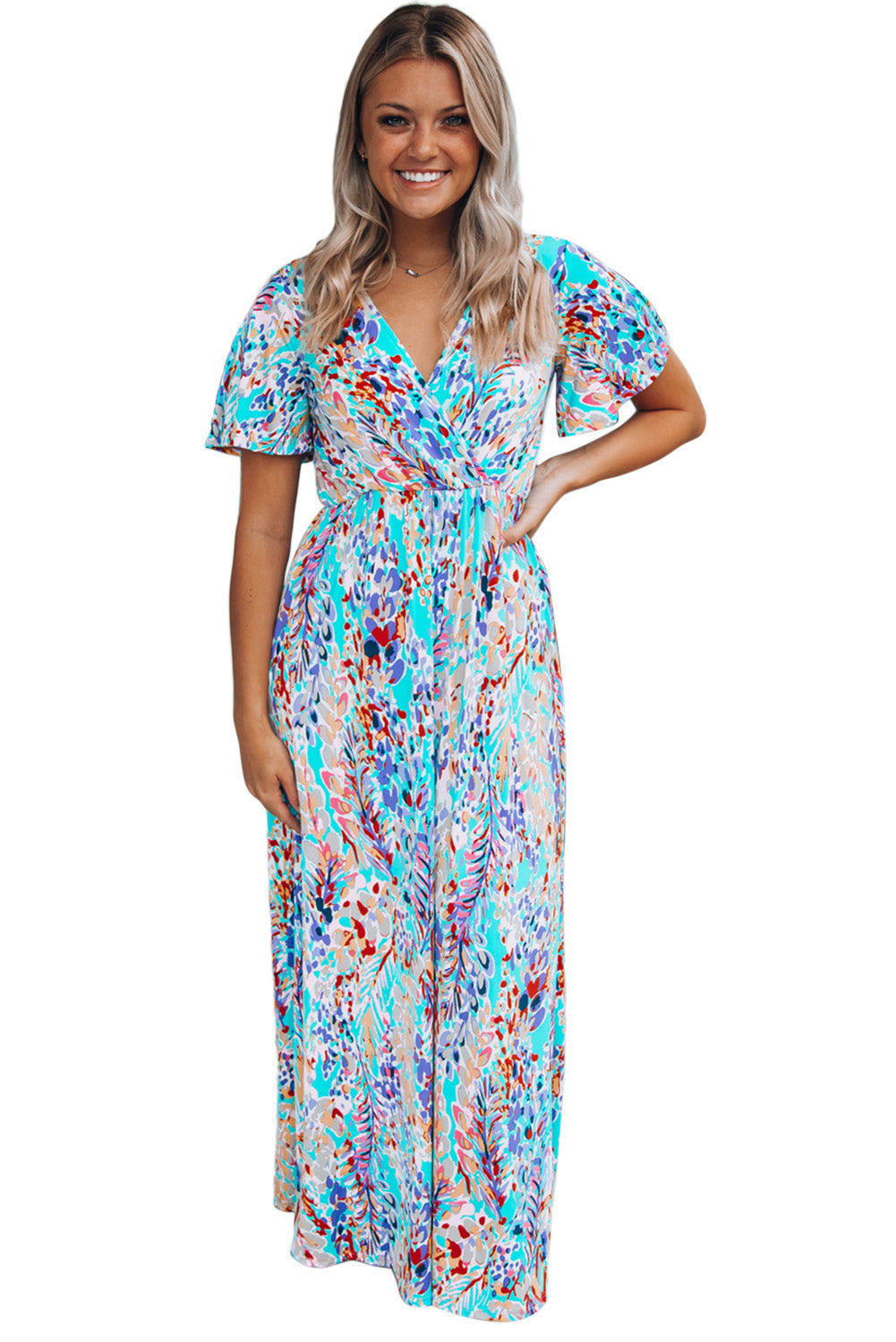 A stylish Wrap V Neck Floral Maxi Dress featuring a vibrant floral print, flutter sleeves, and a flattering wrap design, perfect for summer occasions.