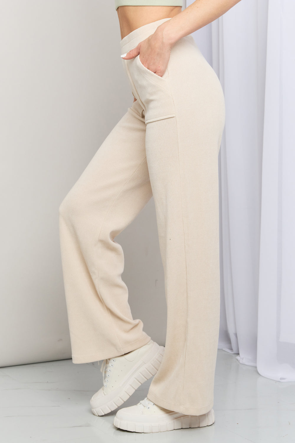 Yelete Elastic Waist Wide Leg Pants in Ivory, featuring a chic wide-leg design and convenient side pockets.