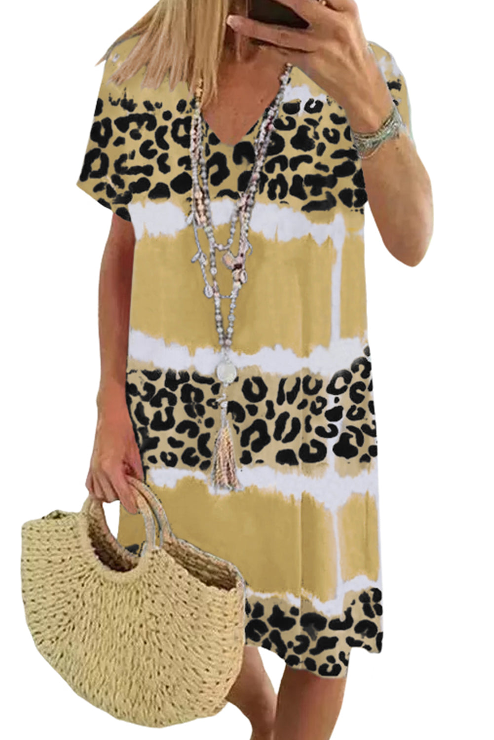 Yellow Leopard Color Block V-Neck T-shirt Dress featuring a vibrant tie-dye and leopard print pattern, short sleeves, and an A-line silhouette.