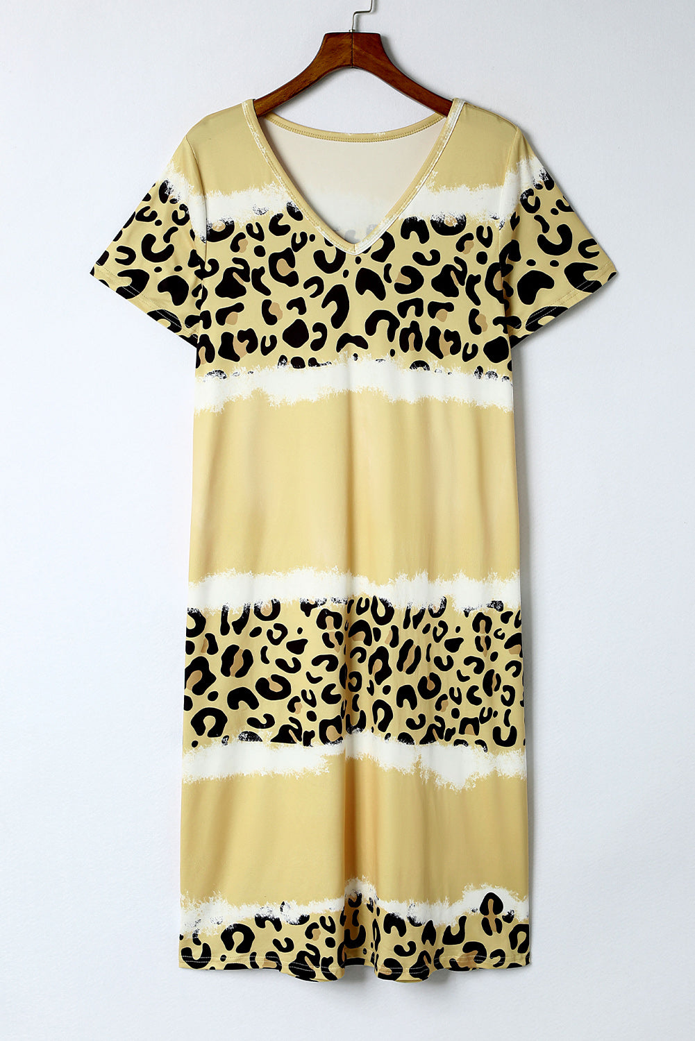 Yellow Leopard Color Block V-Neck T-shirt Dress featuring a vibrant tie-dye and leopard print pattern, short sleeves, and an A-line silhouette.