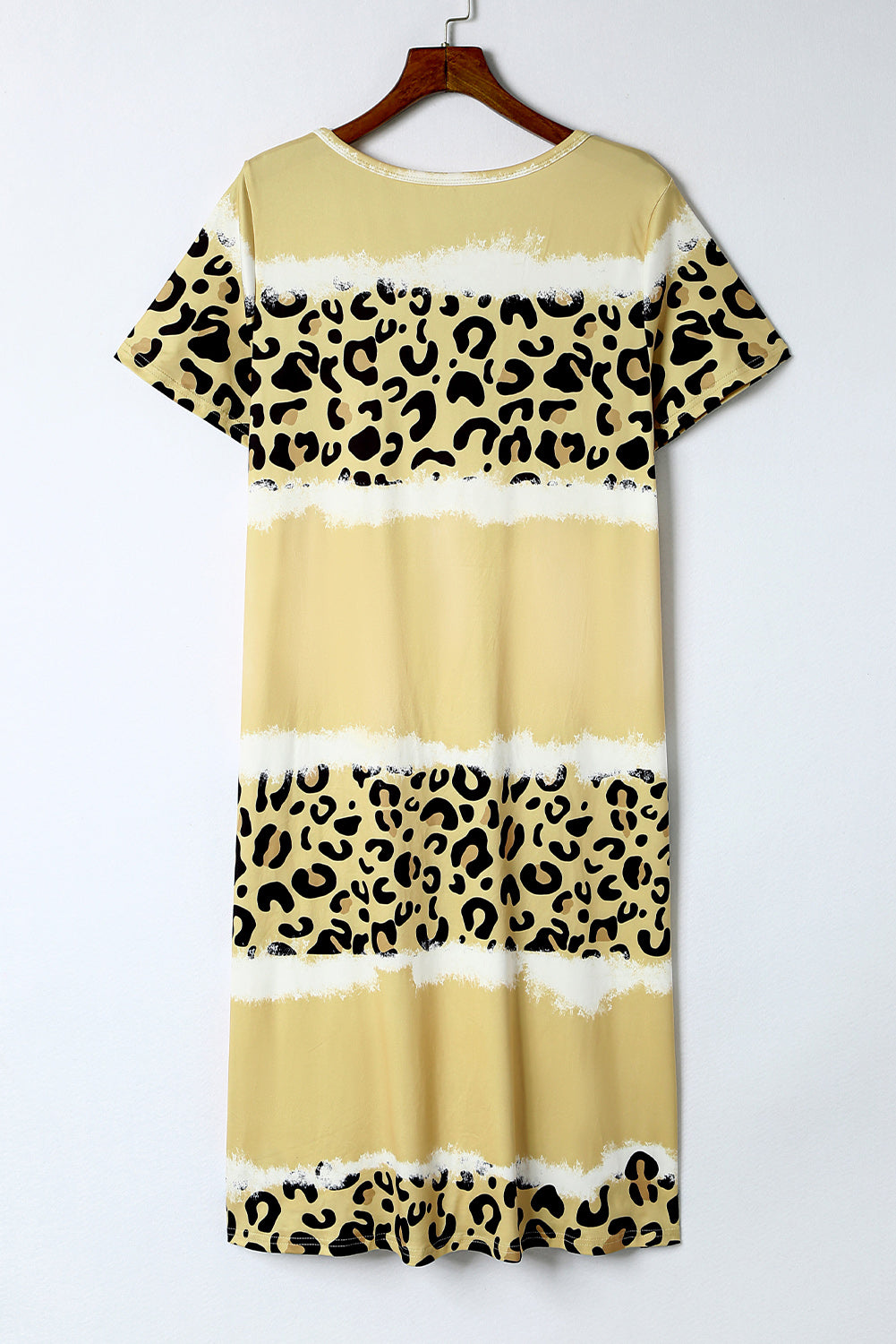 Yellow Leopard Color Block V-Neck T-shirt Dress featuring a vibrant tie-dye and leopard print pattern, short sleeves, and an A-line silhouette.