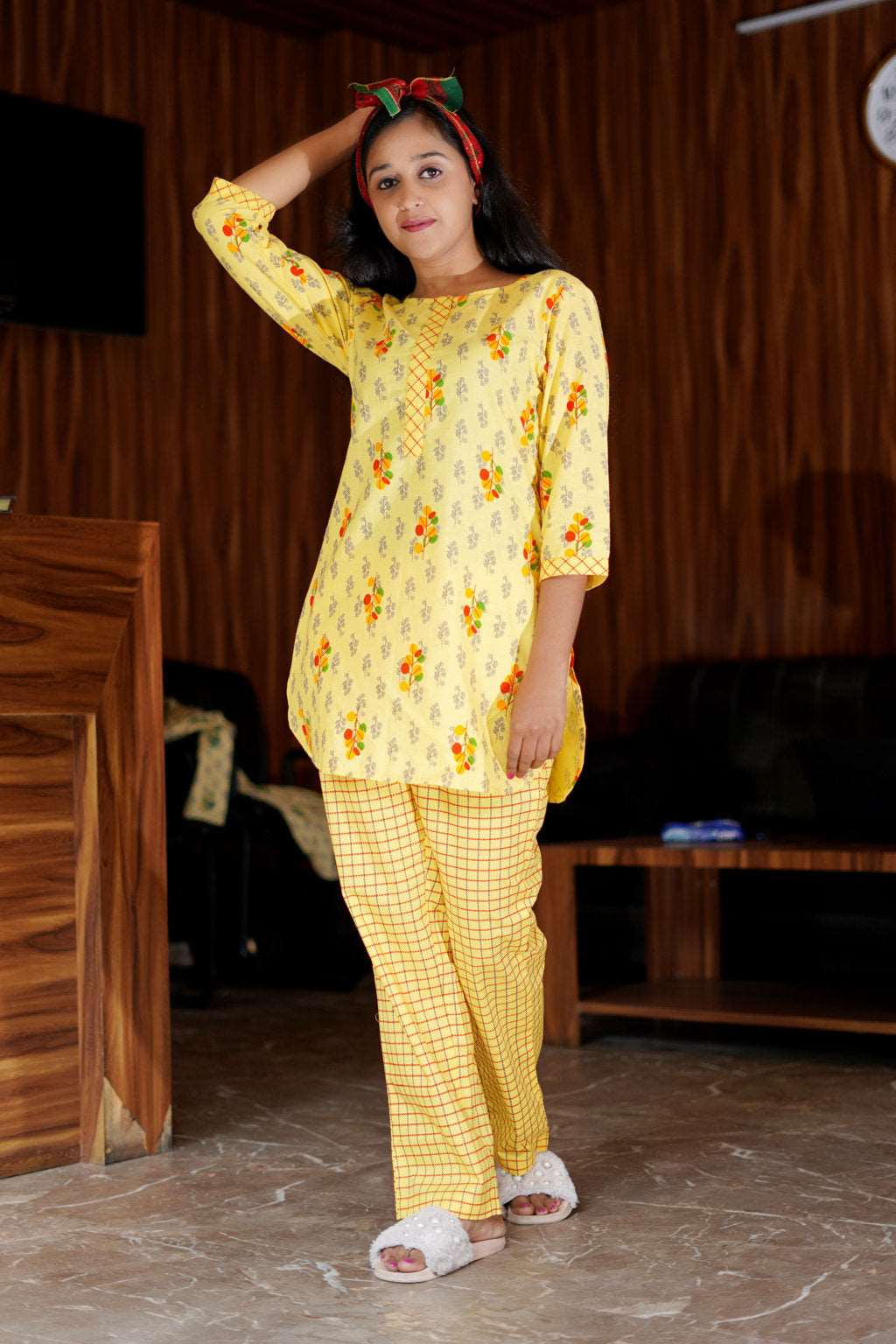 A vibrant yellow printed cotton night suit set featuring a comfortable top and matching pants, perfect for cozy nights.