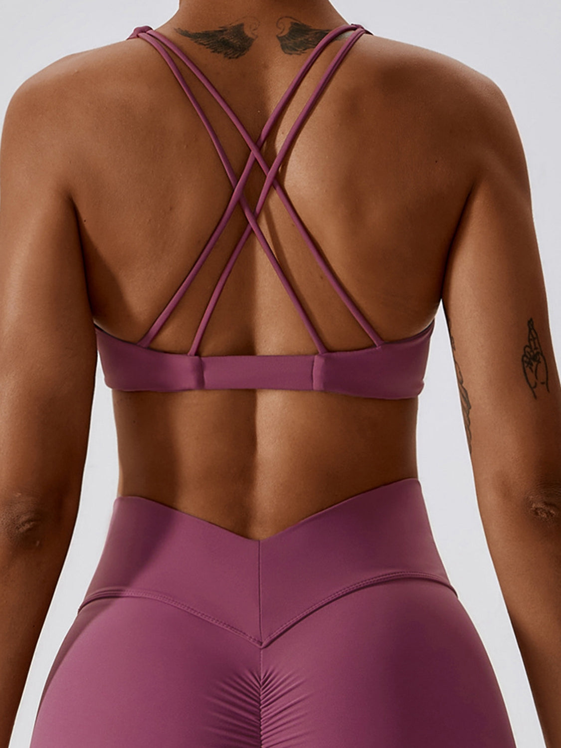 Yoga V-Neck Twisted Sleeveless Sports Bra in solid color, showcasing its sporty design and twisted detail.