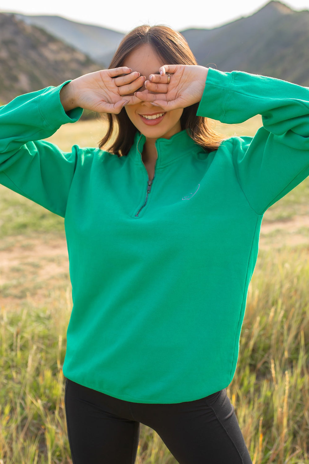 You Are Loved Half Zip Sweatshirt in coral color with heart embroidery on the left chest, showcasing a stylish half zip design.