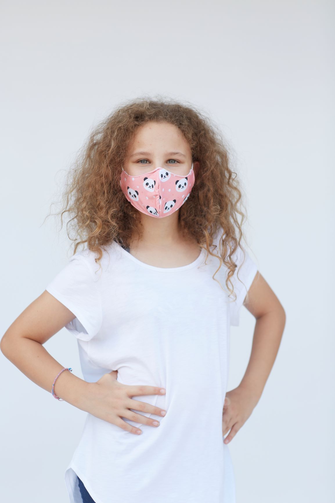 Youth Pink Panda Face Mask featuring a cute panda design, made of breathable cotton and polyester layers, suitable for kids.