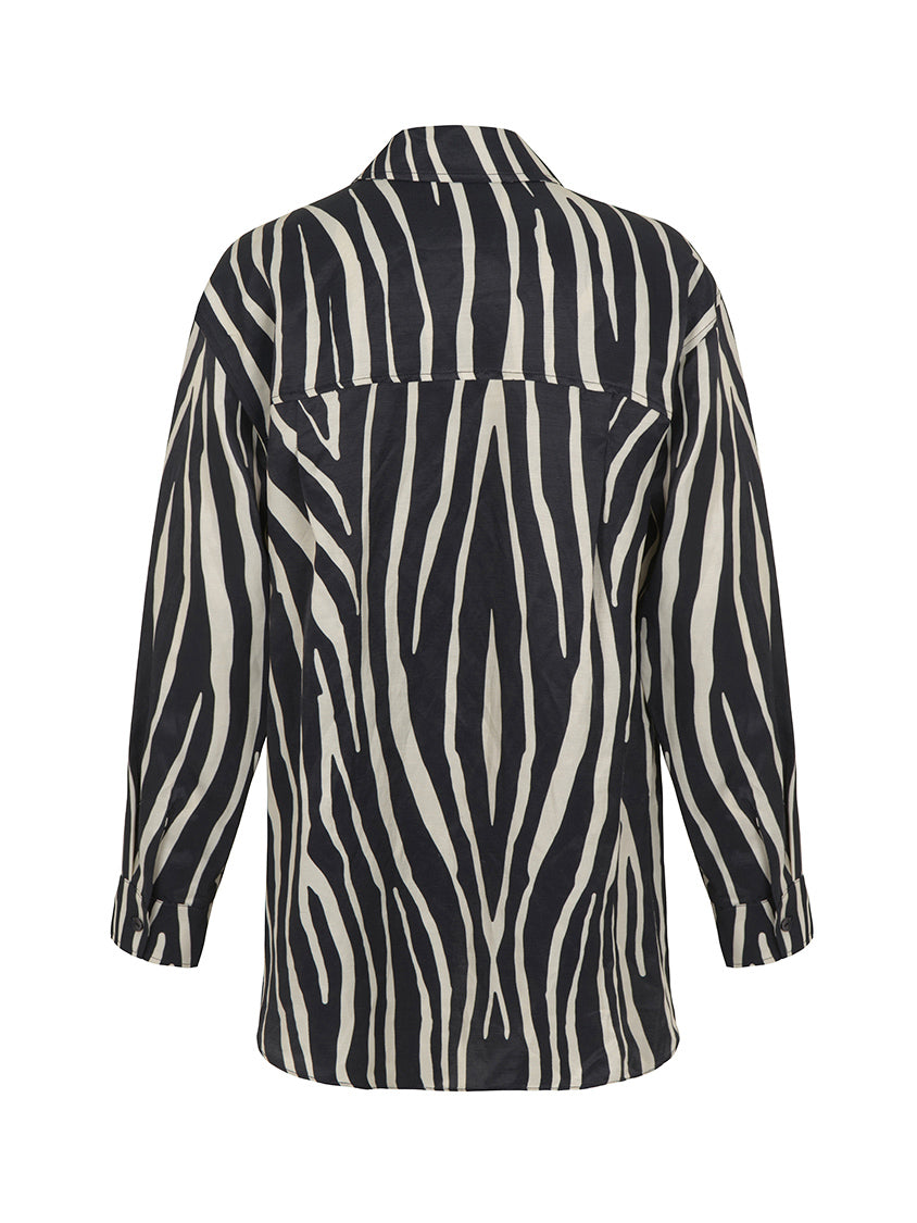 Zebra Print Oversized Linen Shirt featuring a stylish lapel collar and long sleeves with buttoned cuffs in black, white, and purple colors.