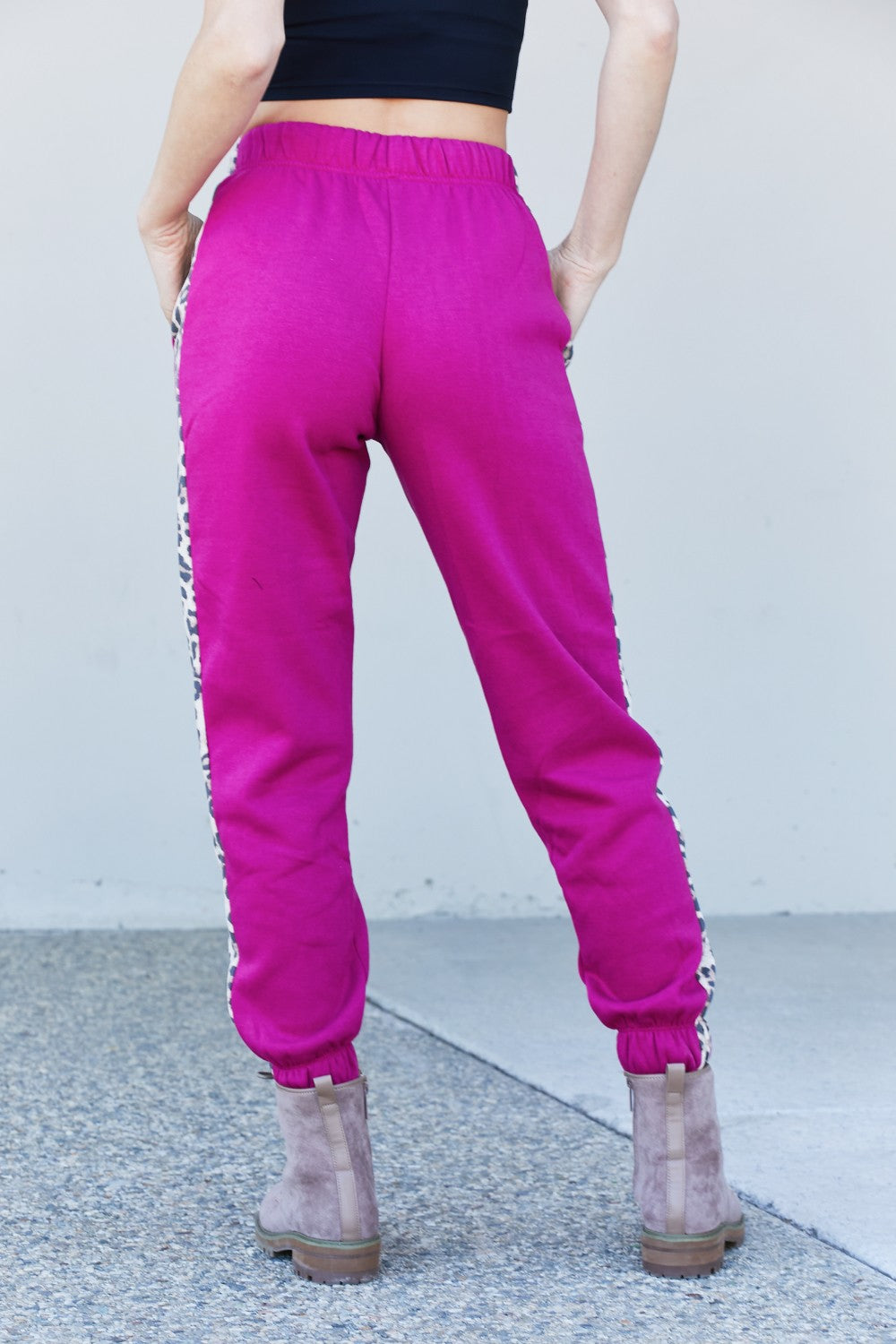 Zenana Animal Lover Full Size Leopard Panel Joggers in Magenta featuring a drawstring waist and side pockets, perfect for casual wear.