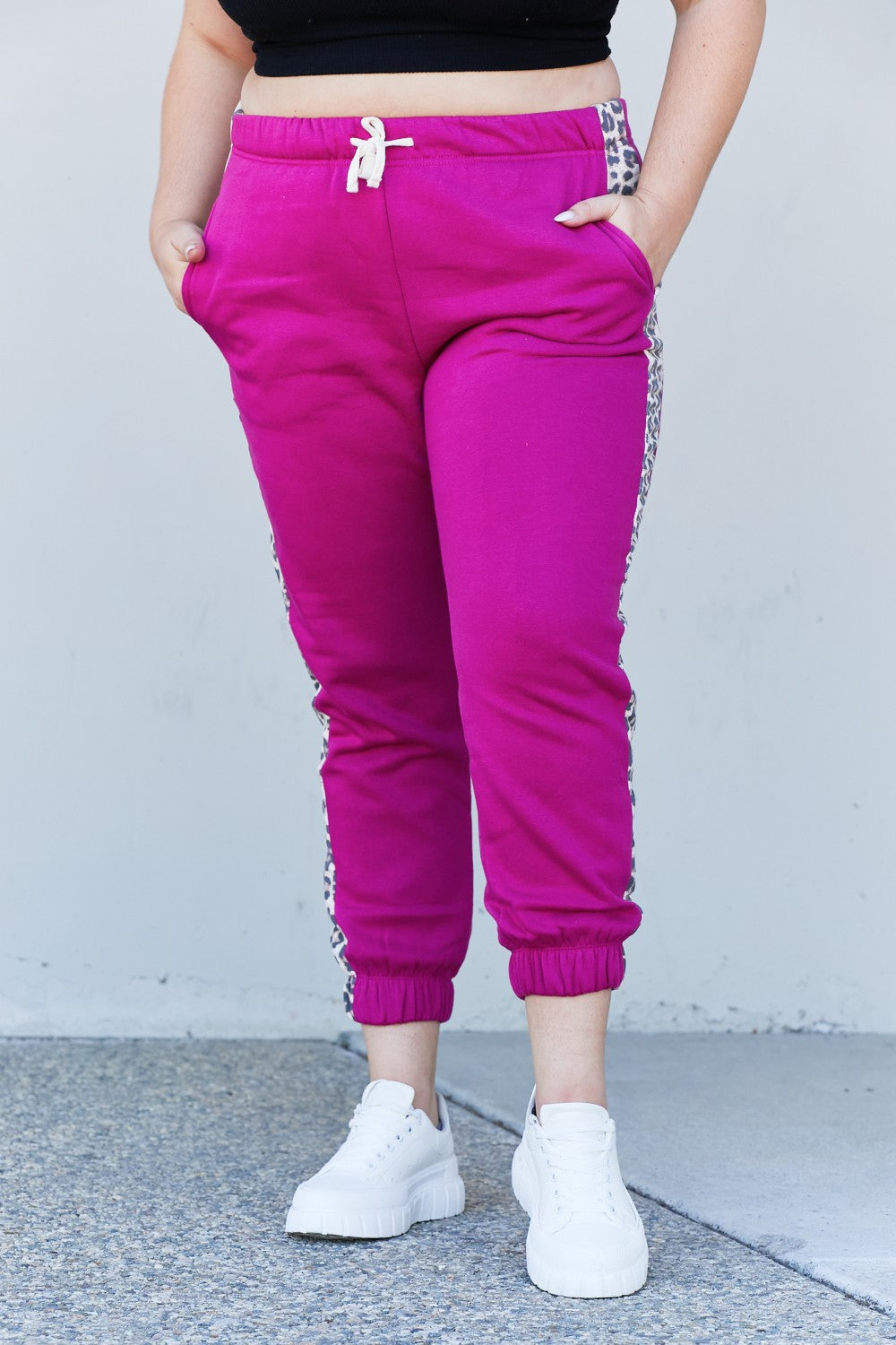 Zenana Animal Lover Full Size Leopard Panel Joggers in Magenta featuring a drawstring waist and side pockets, perfect for casual wear.