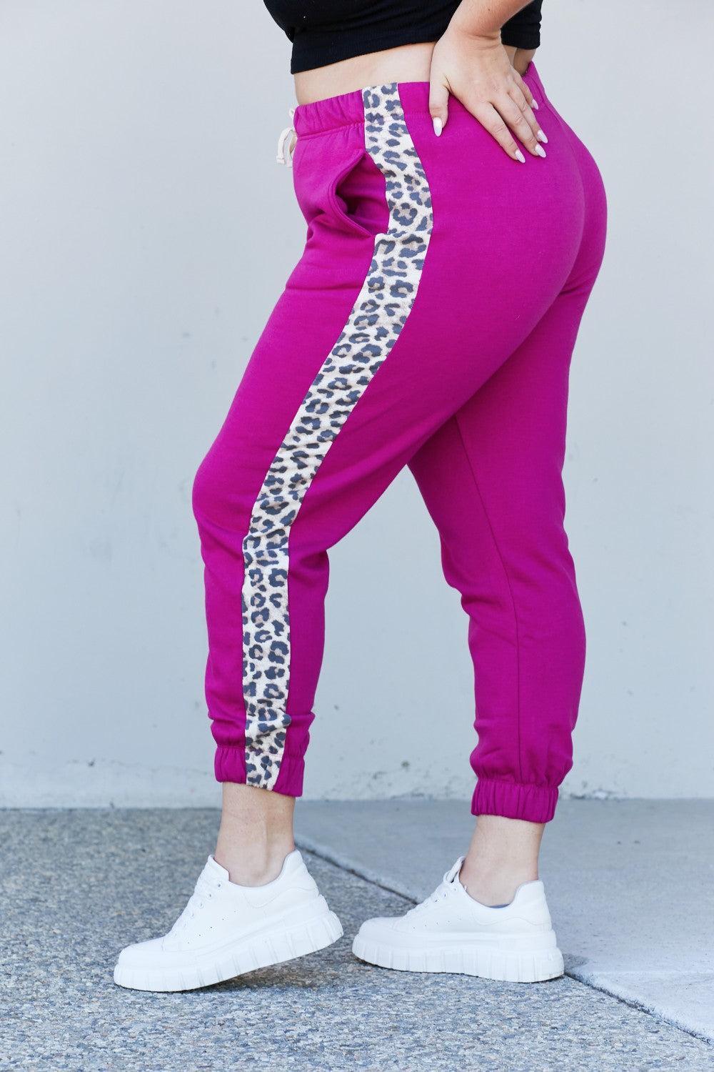 Zenana Animal Lover Full Size Leopard Panel Joggers in Magenta featuring a drawstring waist and side pockets, perfect for casual wear.