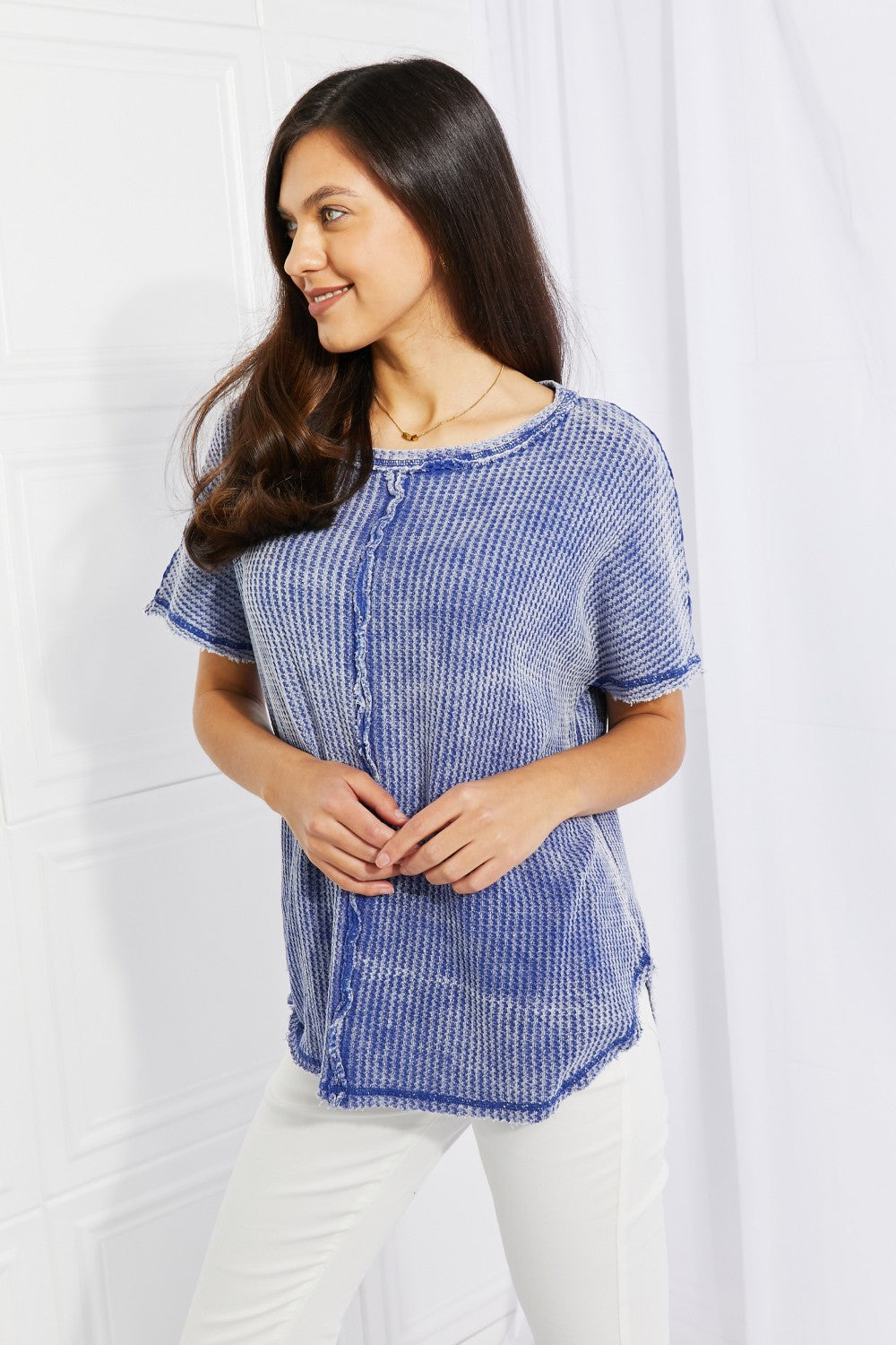 Zenana Start Small Washed Waffle Knit Top in Blue, showcasing its oversized fit and waffle knit texture.