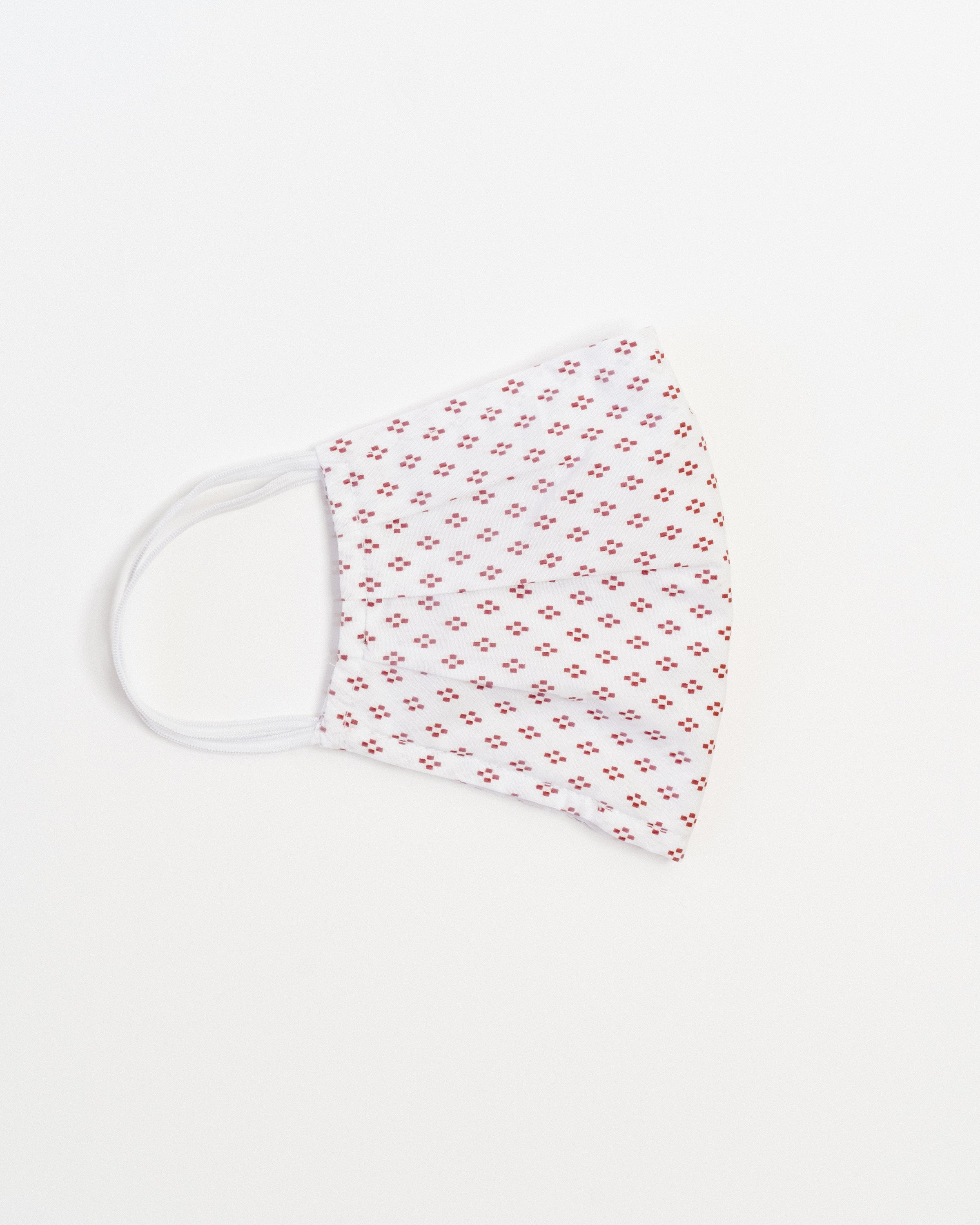 Zermatt Face Mask made of breathable cotton with pleats for comfort, featuring a filter pocket and elastic ear straps.