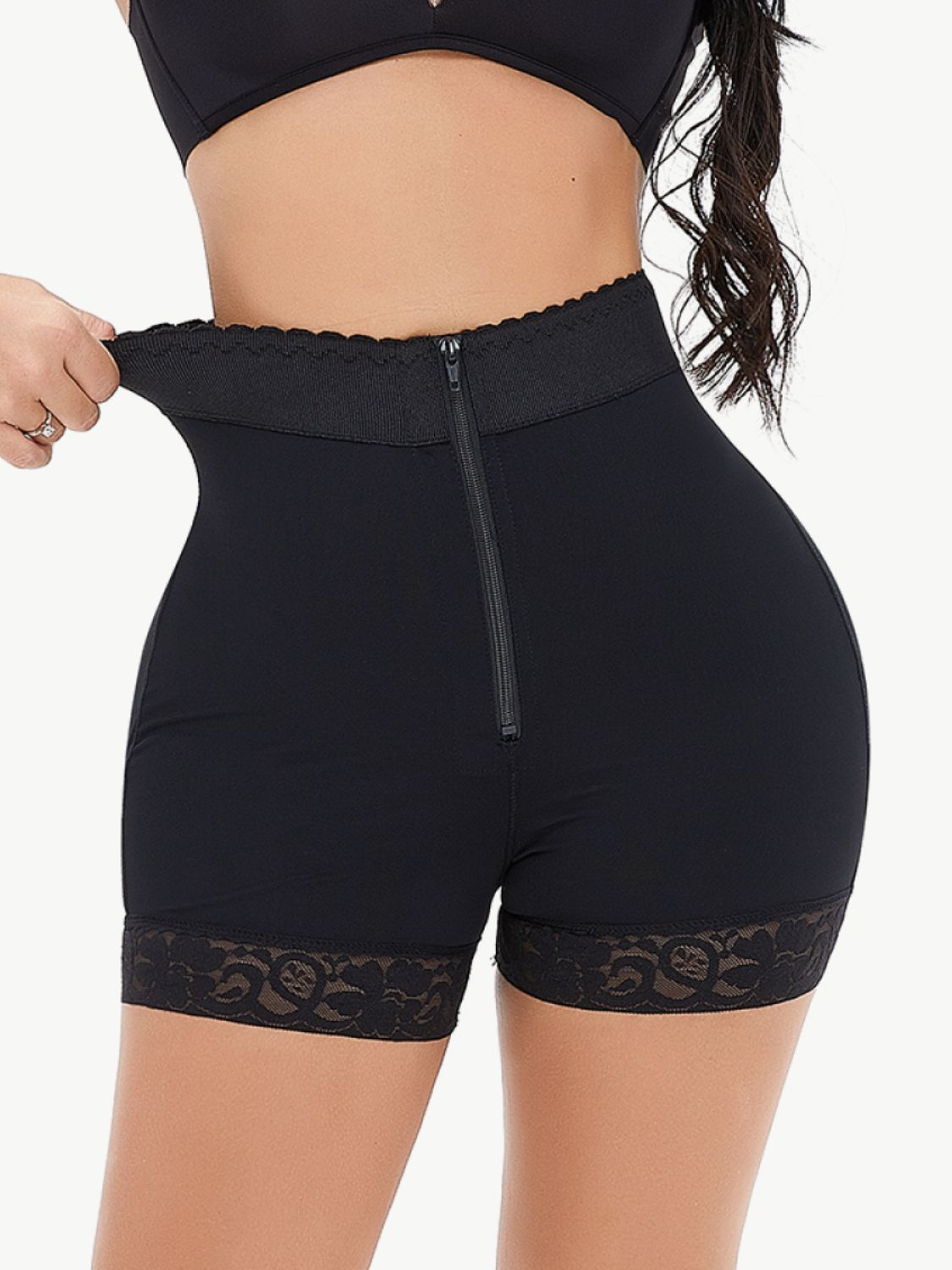 A pair of stylish Zip-Up Lace Trim Shaping Shorts featuring a lace trim and zipper closure, designed for a sexy fit.