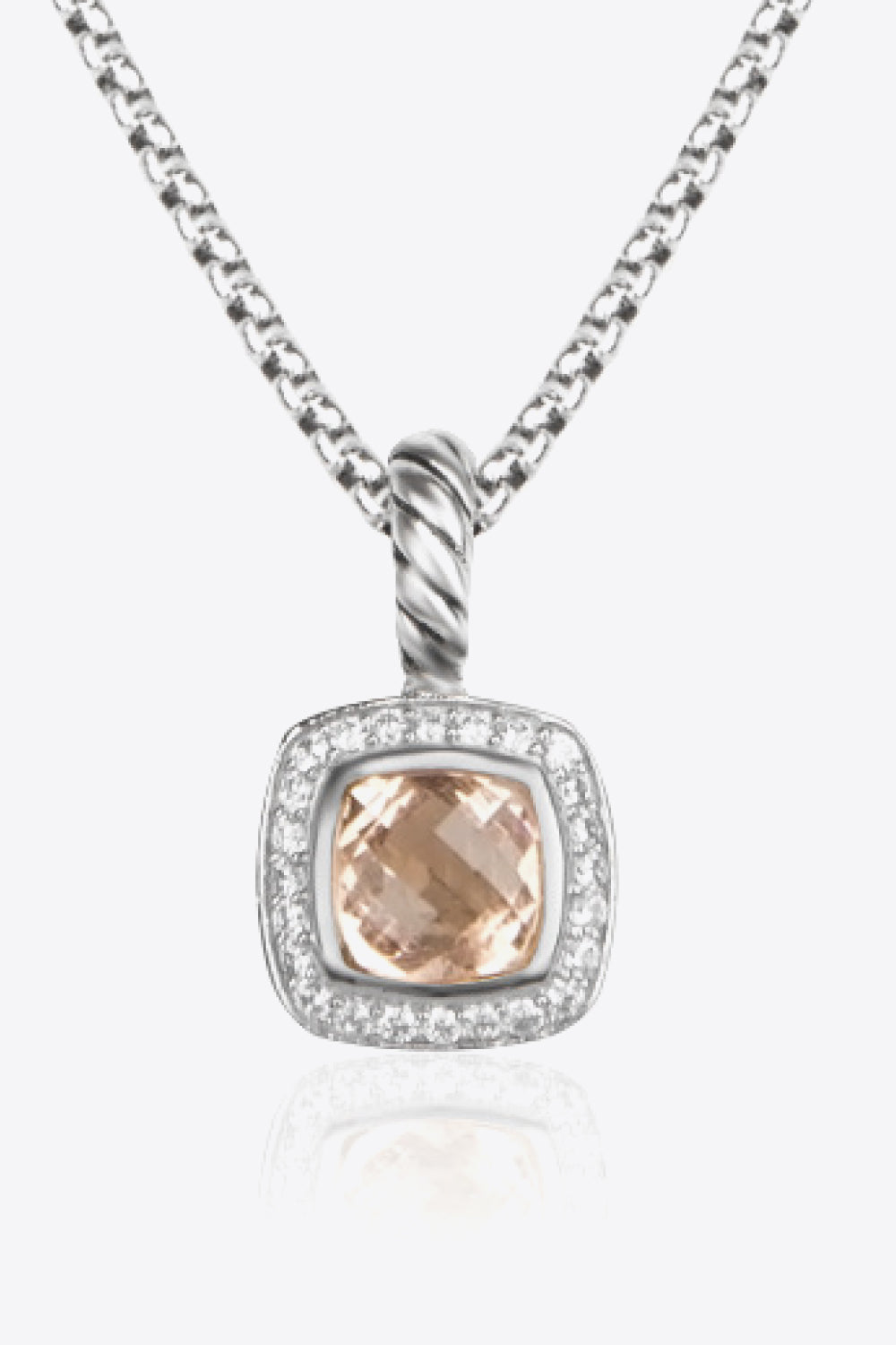 A modern Zircon Pendant Copper Necklace featuring a minimalist design, showcasing a twisted and polished zircon pendant on an 18k platinum-plated chain.