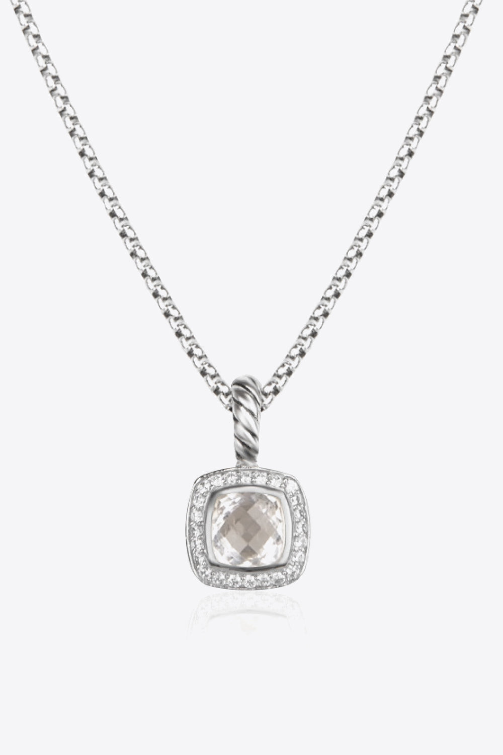 A modern Zircon Pendant Copper Necklace featuring a minimalist design, showcasing a twisted and polished zircon pendant on an 18k platinum-plated chain.